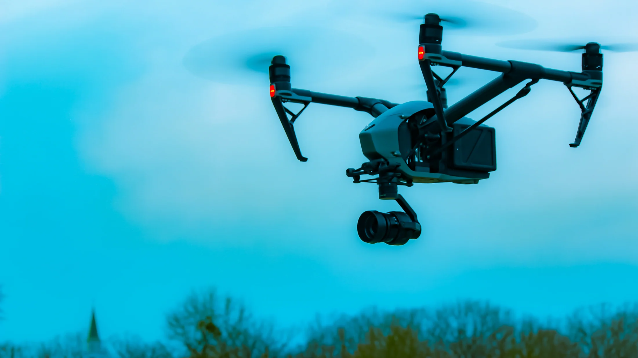 High-end industrial drone platform hovering in the air, showcasing robust enterprise design and advanced payload capabilities